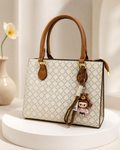 Classic Monogram Handbag with Hanging Doll Keychain