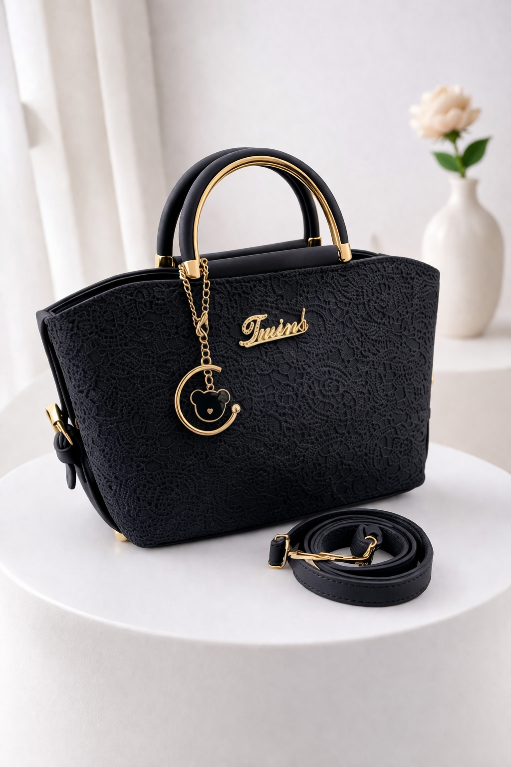 Versatile Handbag with Gold Details & Adjustable Strap
