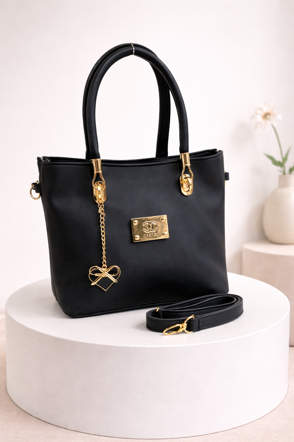 Gold-Accented Handbag with Detachable Strap