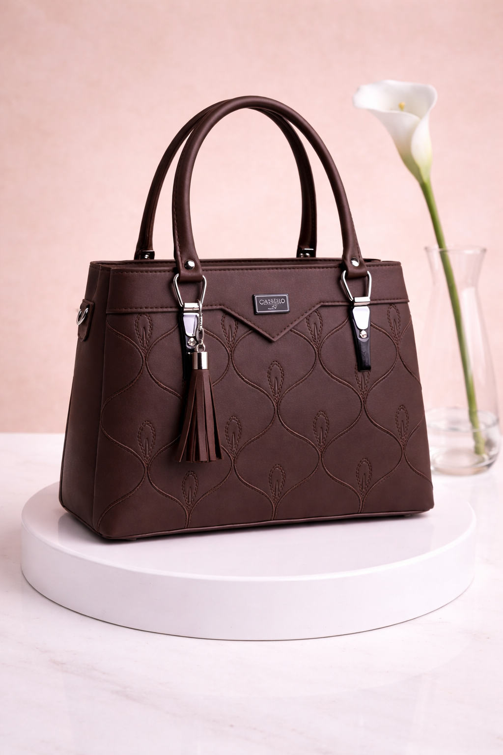 Chic Brown Structured Handbag with Tassel Charm