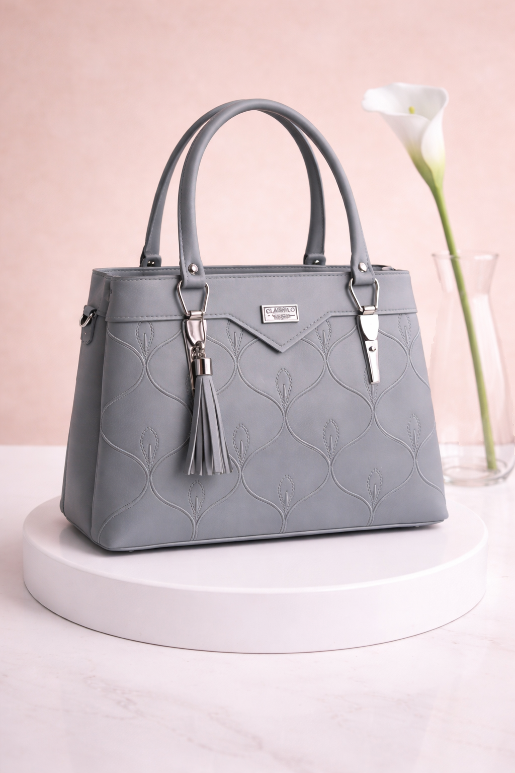 Chic Brown Structured Handbag with Tassel Charm