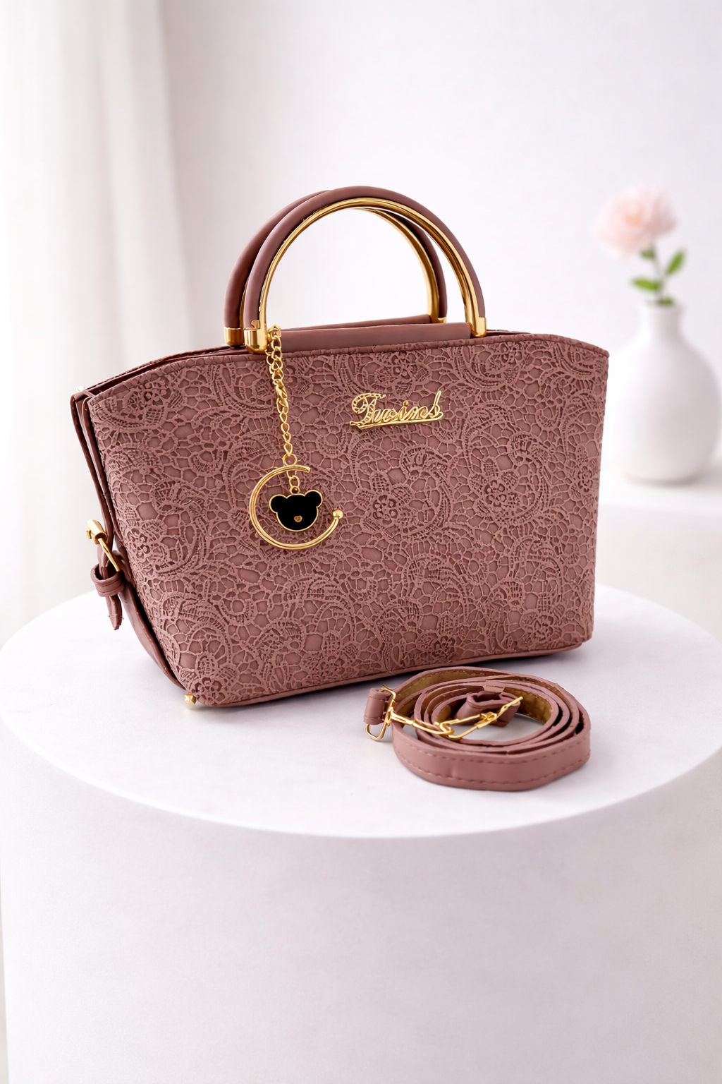 Versatile Handbag with Gold Details & Adjustable Strap
