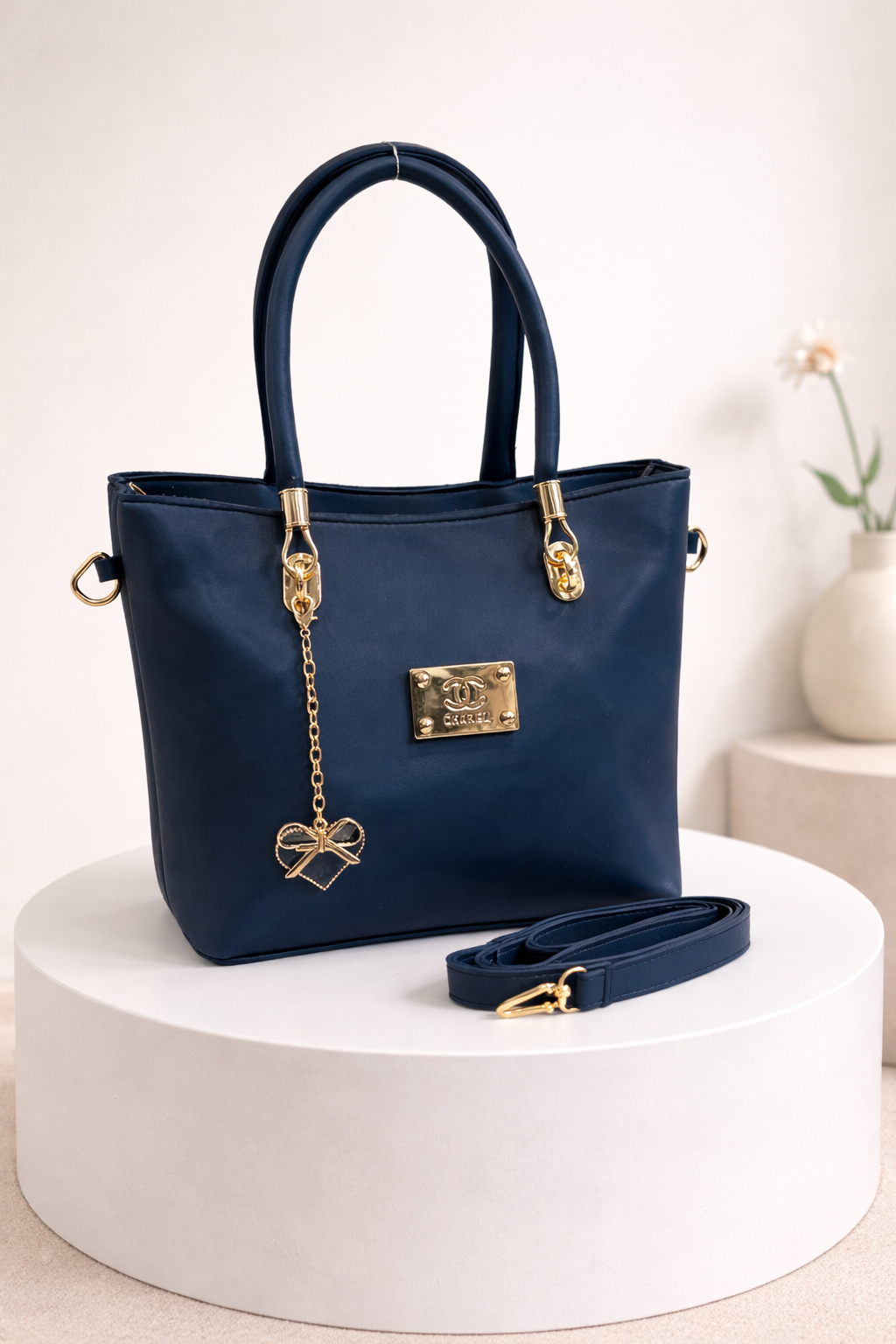 Gold-Accented Handbag with Detachable Strap