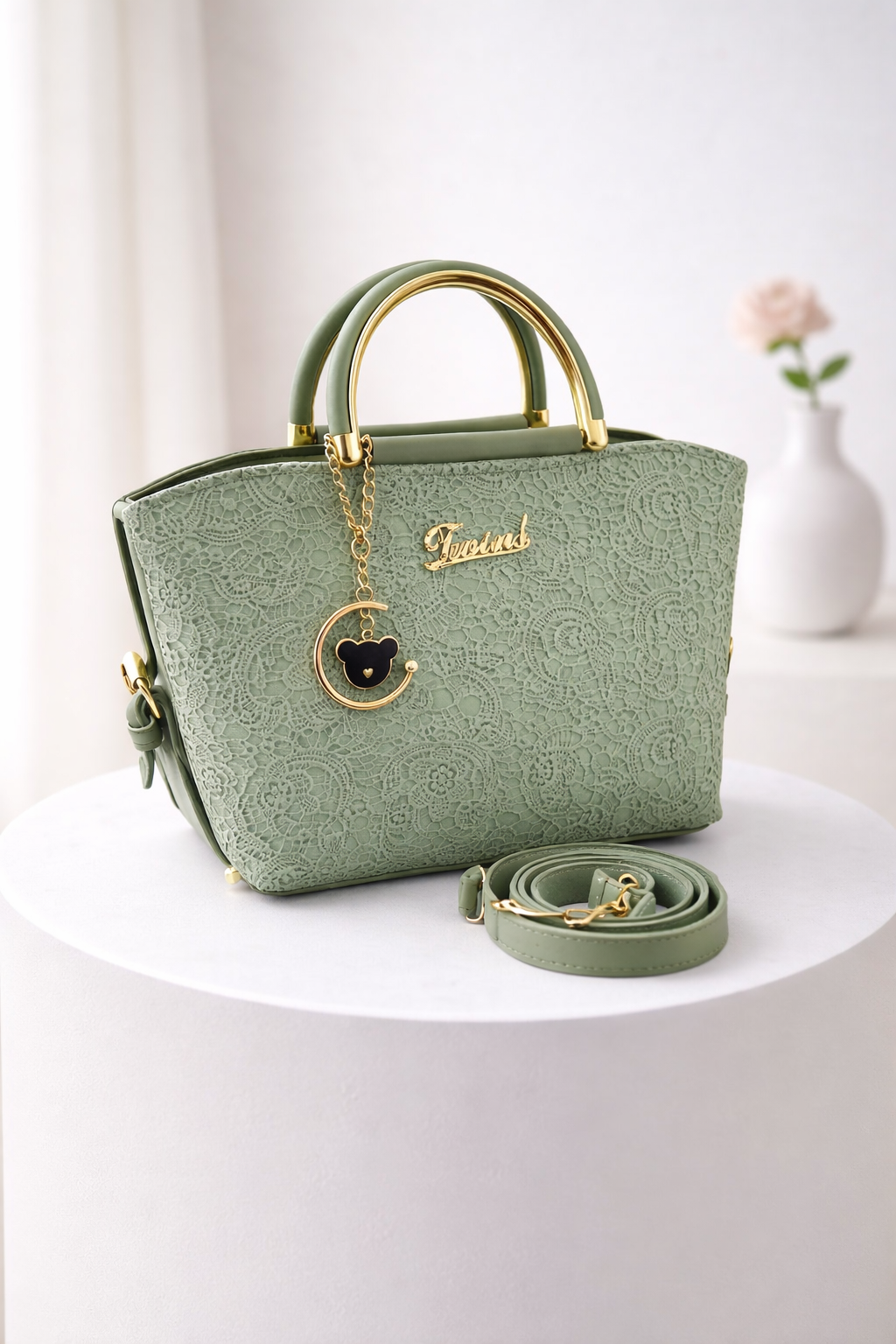 Versatile Handbag with Gold Details & Adjustable Strap