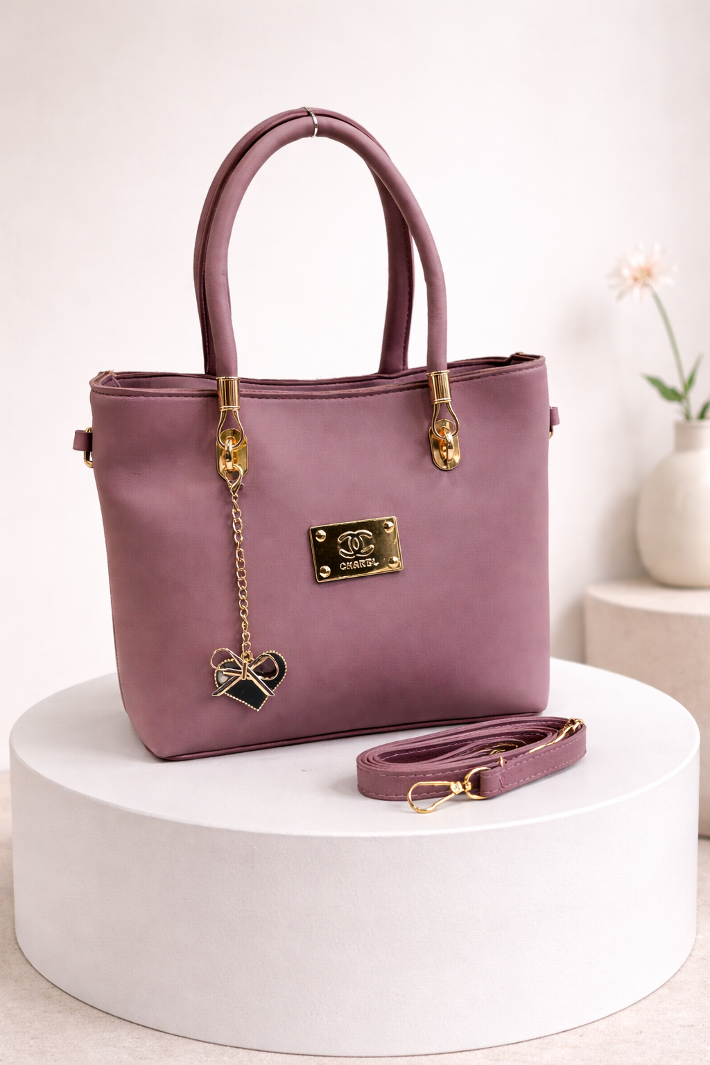 Gold-Accented Handbag with Detachable Strap